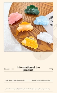 Detail of cloud-shaped acrylic hair claws in six colors with 5.5cm x 3.1cm dimensions