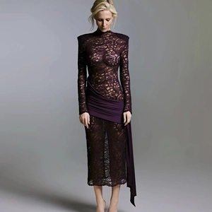 Detail of purple lace dress featuring a high neck and irregular waist drape detail