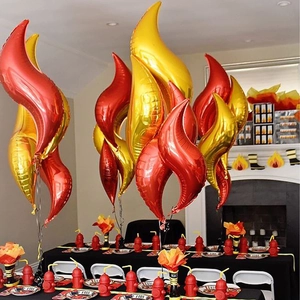 Firefighter party decoration set with flame foil balloons and red hydrant shaped cups