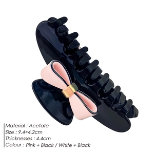 Elegant black acetate hair claw clip with pink bow design, size 9.4x4.2cm for women