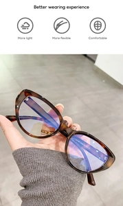 Detail of cat eye glasses with E5167 model number and purple anti-blue light coating