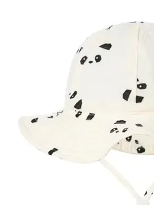 Detailed view of white cotton baby sun hat featuring cute panda patterns and windproof straps
