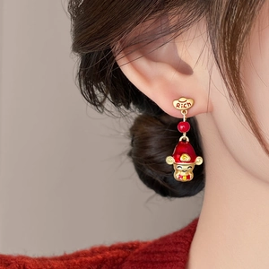 Detail view of New Chinese style God of Wealth earrings with red enamel and Rich text