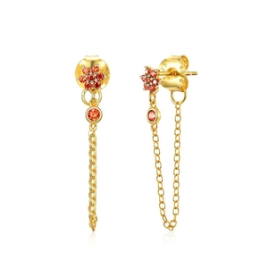 Macro view of S925 hallmark on gold plated flower earrings with red zircon and chain fringe