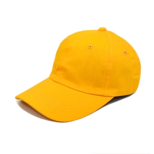 Close-up of a yellow cotton baseball cap showing detailed stitching and curved brim