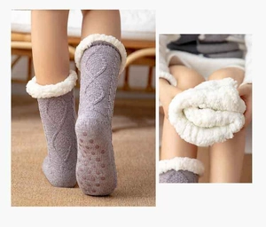 Detail of gray cable-knit thermal socks with plush lining and non-slip grippers