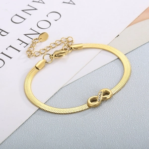 Detail of 4mm gold-plated infinity link bracelet with micro-set zircon stones