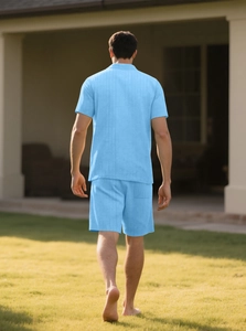 Rear view of men's light blue vertical striped short sleeve shirt and shorts set