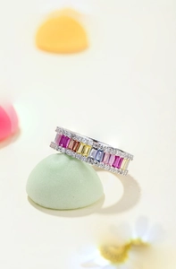Macro detail of S925 silver ring featuring multi-color rectangle zircons and pavé setting