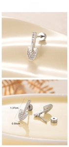 Macro view of shovel shaped cartilage stud earring with cubic zirconia and dimensions