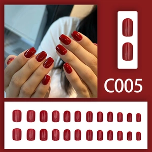 Short square deep red glossy press-on nails set including 24 pieces in various sizes