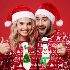 Glittery Christmas ties for kids featuring green tree and orange snowman felt designs