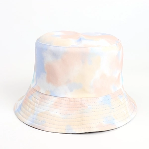 Detail of macaron tie-dye bucket hat featuring multi-colored print and reinforced stitching