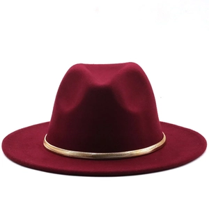 Close-up of wine red wool fedora hat featuring a stylish gold metal chain decoration