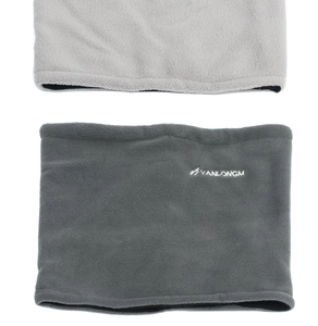 Close-up of thick winter neck warmer featuring soft fleece texture and embroidered logo