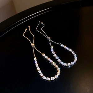 Adjustable drop zircon bracelets in gold and silver finish with pear-cut crystals