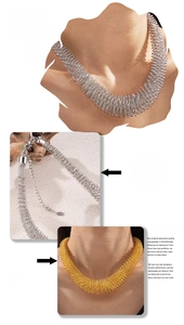 Detail of chunky spring spiral choker featuring 18k gold plating and lobster clasp closure