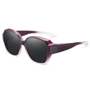 Women's polarized fit-over sunglasses with purple gradient frame and dark lenses