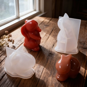 DIY silicone molds for Easter bunny candles and handmade plaster rabbit figurines