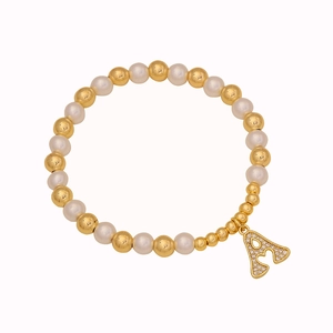 Beaded pearl bracelet with gold metal accents and a sparkling crystal letter A charm