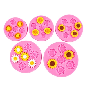 Pink silicone sunflower and daisy fondant molds for DIY cake decorating and crafts