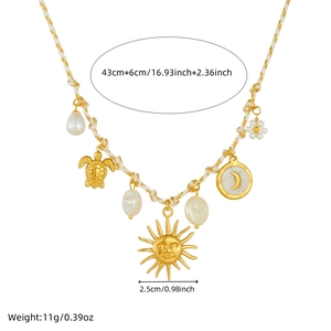 Bohemian woven necklace with gold ocean charms, sun pendant and natural baroque pearls