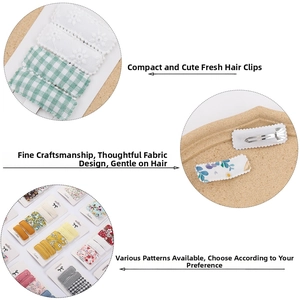 Detailed view of floral embroidery fabric hair clips with secure metal snap closure back
