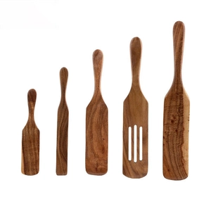 5-piece teak wood kitchen utensil set including spatulas and slotted spoons on white