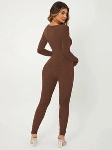 Back view of a slim fit deep brown ribbed knit jumpsuit with long sleeves for women