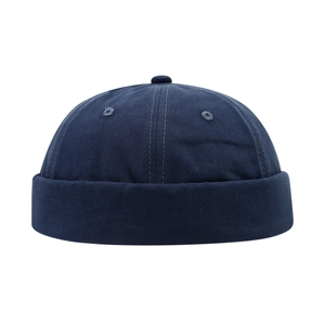 Bonnet docker bleu foncé pour enfants en coton avec œillets d'aération et bouton