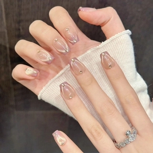 Faux ongles dégradés violet fait main avec effet œil de chat et détails dorés