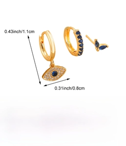 Detailed view of gold earrings set with blue zircon eye charms and leaf stud measurements
