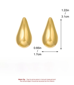 Detailed view of golden teardrop earrings showing 3.1cm height and polished alloy finish