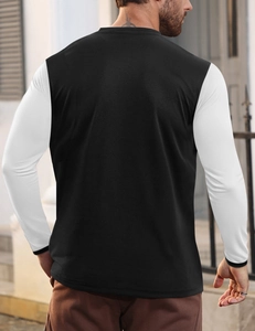 Detailed back view of a men's long sleeve Henley shirt with black and white color blocking