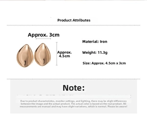 Detailed view of golden irregular teardrop earrings with dimensions and material specs