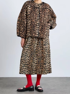 Detail shot of the quilted leopard print jacket and skirt set with a textured finish