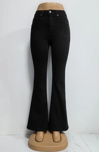 Detailed view of high-waist flared black jeans with slimming fit and bootcut silhouette