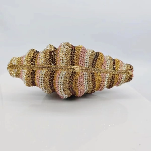 Luxury conch-shaped evening clutch bag with multicolored crystals and gold hardware