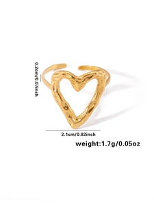 Detail view of golden hammered heart ring showing 2.1cm width and 0.2cm thickness