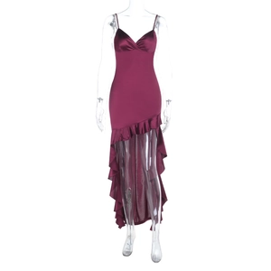 Detail of burgundy satin dress with v-neckline, ruffled asymmetric hem and glossy finish