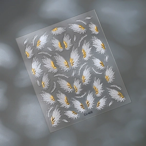 3D white angel wings nail stickers with gold foil details model Co-409 on gray background