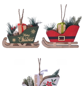 Three-piece wooden Christmas sleigh set with mini pine cones and festive greenery ornaments