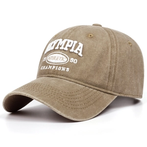 Detail of Olympia 1990 white 3D embroidery on washed khaki vintage cotton baseball cap