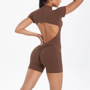 Detail of chocolate brown backless sports romper with heart-shaped cutout and scrunch butt