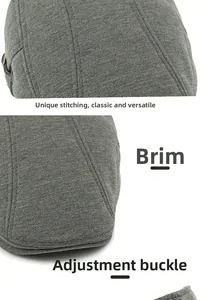 Detailed macro view of the knitted grey newsboy cap showing twill fabric and stitching