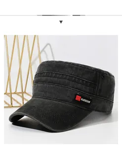 Detail of washed black flat top army cap featuring FS FASHION woven side label