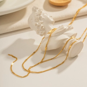 Minimalist double layer Y-shaped 18K gold stainless steel necklace on white bust model
