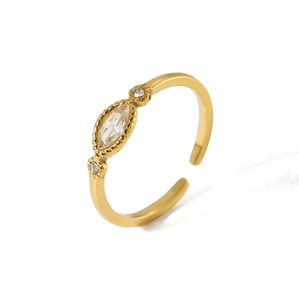 Detail of adjustable gold ring with marquise and round cut white zircon stones