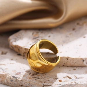 18K gold plated stainless steel open ring with hammered texture on silk and stone base