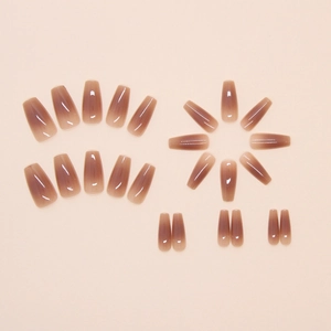 Detail of coffee ombre coffin press-on nails with glossy mirror finish 24pcs set